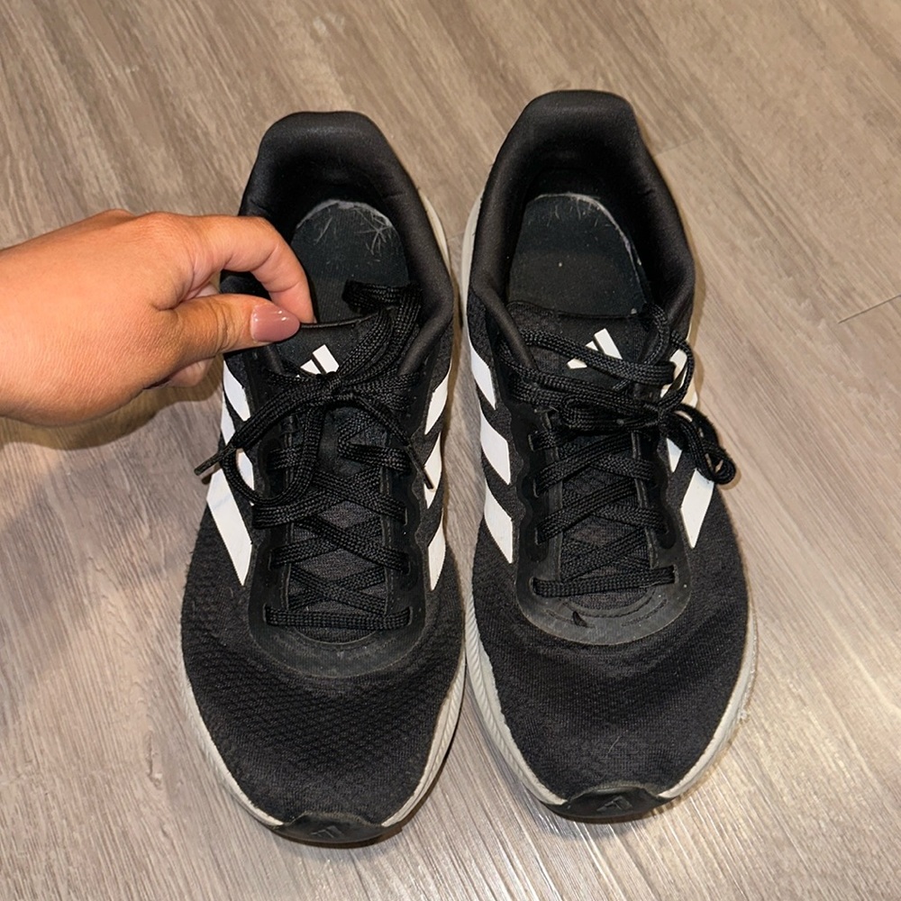 Mens adidas black shoes size 10.